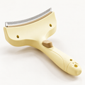 Yellow self-cleaning comb for cats and dogs